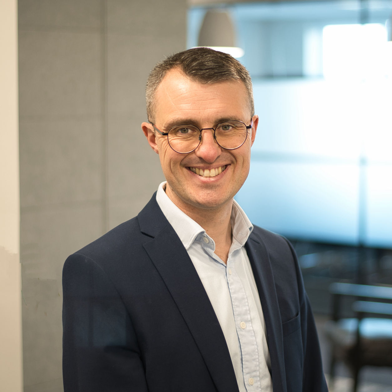 Male corporate headshot at there place of work 