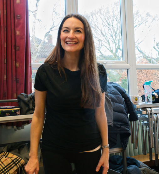 female and male dancers and actors at a rehearsal for Chicago 
