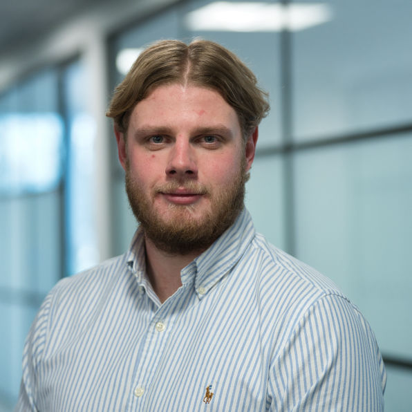 Male corporate headshot at there place of work 