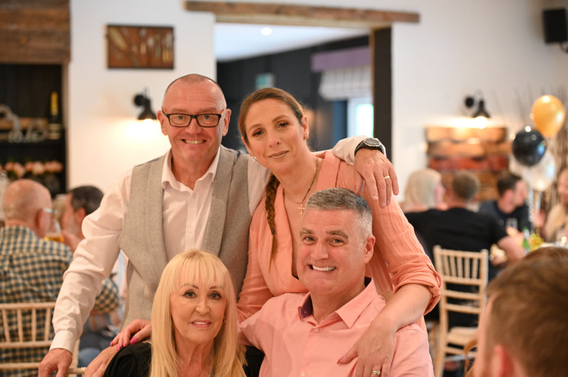 Family group at a 60th Birthday Party 